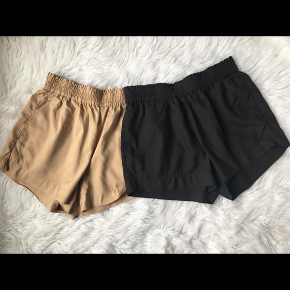 beige and black flowy shorts. - Picture 1 of 1
